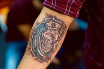 Aquarius Tattoo Designs for Men 3